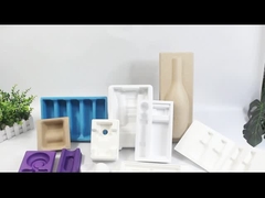 Emballages dans des plateaux de pâte moulée